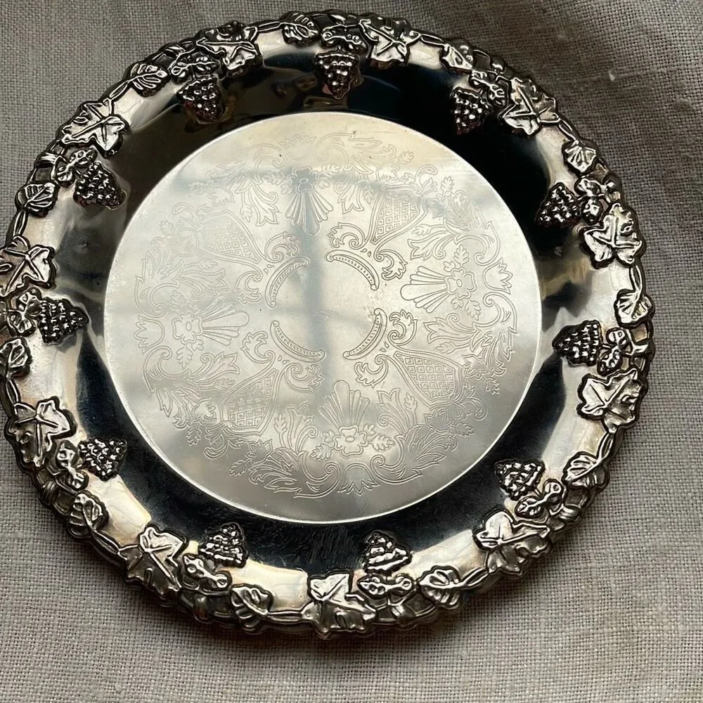 VTG Hong Kong etched grape leaves wine bottle coaster.